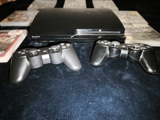 Consola PS3 Negra con 2 Mandos y Juegos