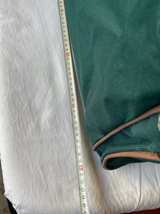 Maleta de viaje verde y marrón