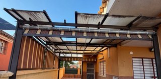 Pérgola de aluminio con toldo retráctil