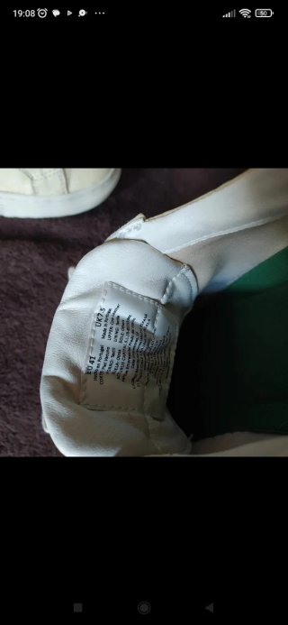 Zapatillas de piel blancas