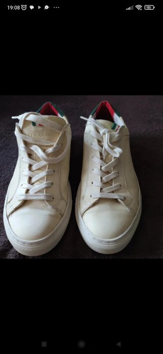 Zapatillas de piel blancas