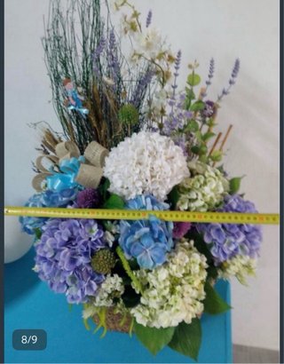 Cesta de flores decorativa
