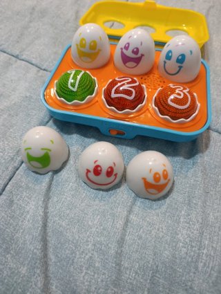 Juguete huevos musicales Bright Starts