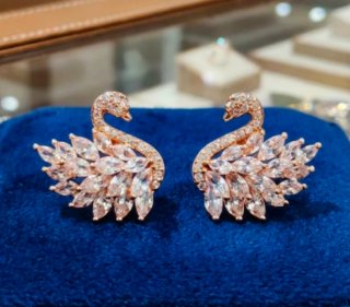 Orecchini a forma di cigno donna oro rosa