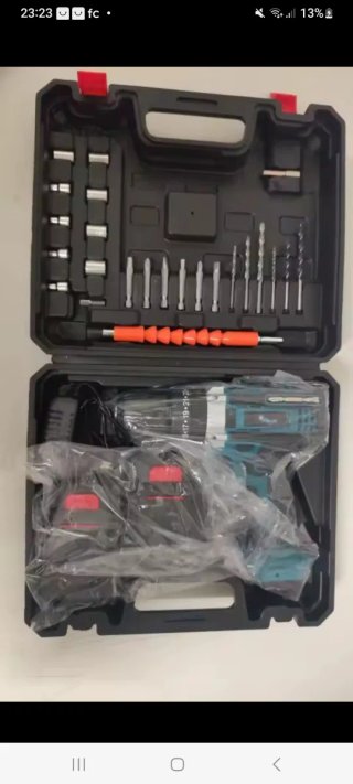 Taladro con maletín y accesorios