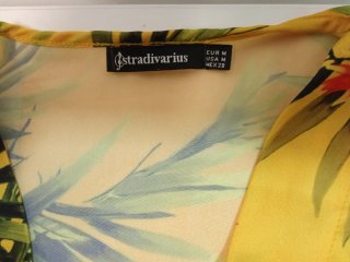 Blusa Stradivarius flores amarillas T.M