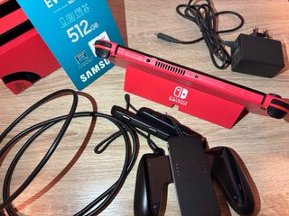 Nintendo Switch OLED Edición Mario Roja + juegos