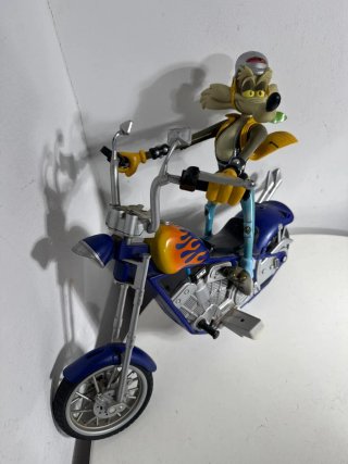 Wile E. Coyote Figure su Moto