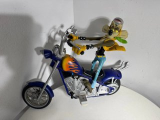Wile E. Coyote Figure su Moto