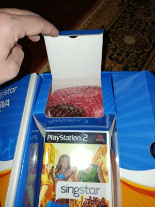 SingStar Latino PS2 + Micrófono