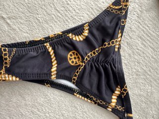Bikini brasileño negro y dorado