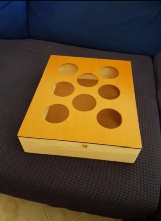 Caja de madera para juegos de gato