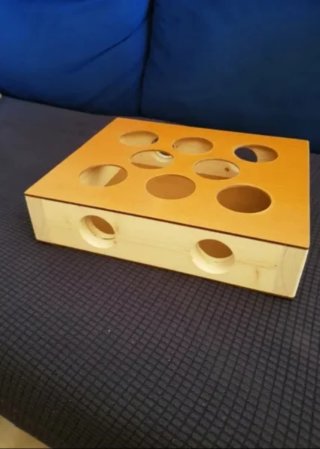 Caja de madera para juegos de gato