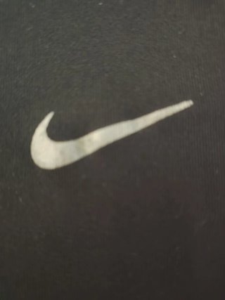 Mallas piratas Nike negras y rosas
