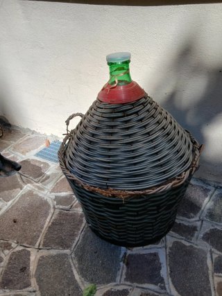 Damigiana in vetro con cestello