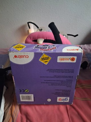 Muñeco morado con ojos saltones