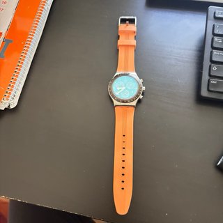 Reloj Swatch Naranja y Plateado