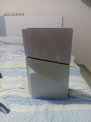 Ps5 Slim versión disco con mando y cascos