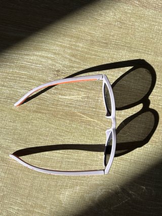 Gafas de sol Polaroid niña rosa lila y naranja