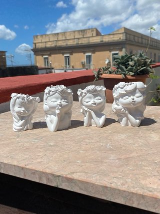 Set 4 vasetti decorativi in gesso