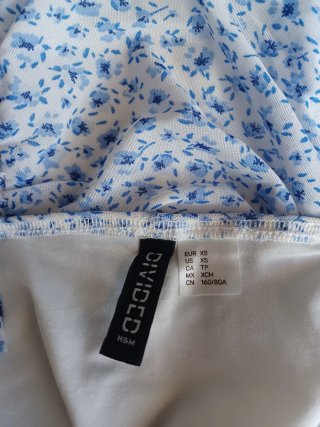 Vestido floral ajustado con fruncido T. XS