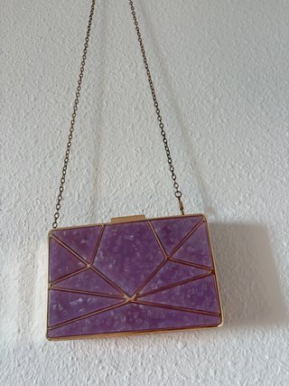 Bolso de fiesta dorado con purpurina