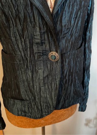 Chaqueta brillante en tono azul
