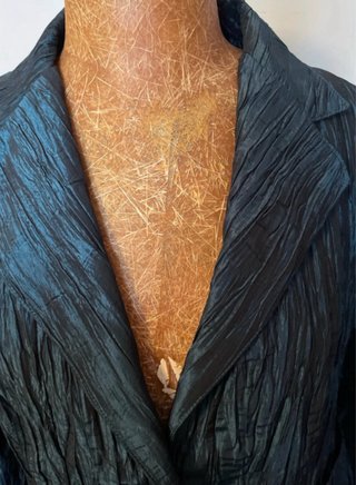 Chaqueta brillante en tono azul