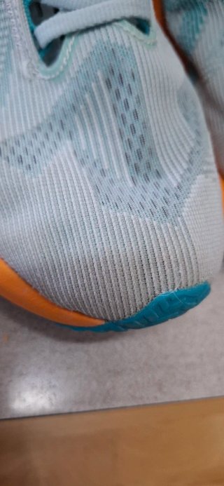 Asics Novablast 5 Naranja/Verde Azulado