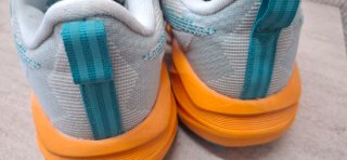 Asics Novablast 5 Naranja/Verde Azulado