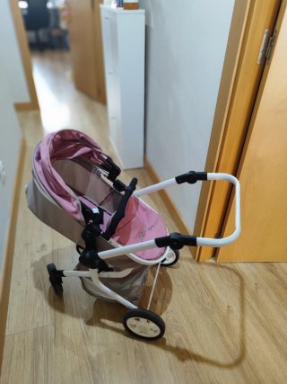 Cochecito de muñecas rosa con capota.perfecto.