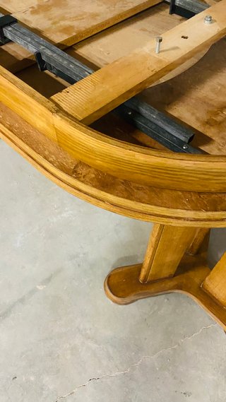 Mesa de comedor redonda de madera extensible