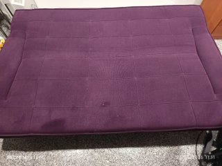 Sofá-cama morado de tela