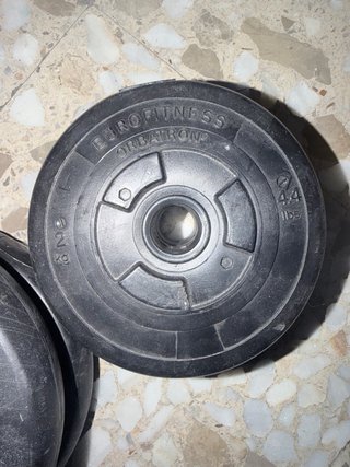 Conjunto de pesas y barra