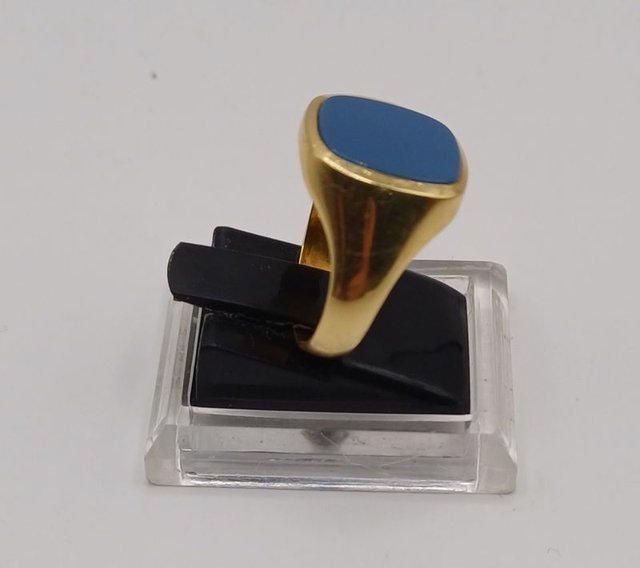 Sello placa azul de oro 18k, 4,25gr. Ref. G-824.