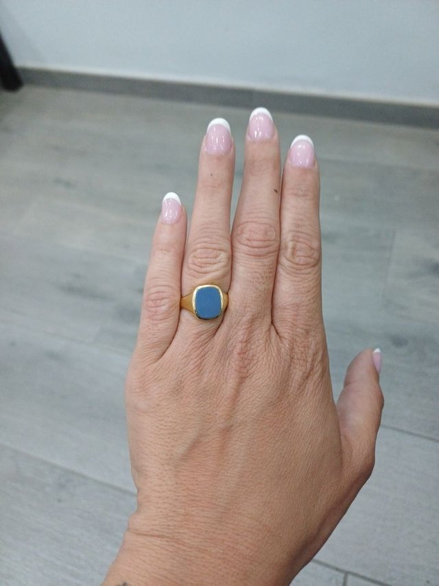 Sello placa azul de oro 18k, 4,25gr. Ref. G-824.