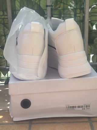 Scarpe sneakers bianche suola spessa