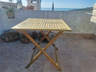Mesa plegable de madera para terraza