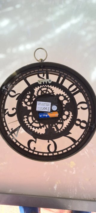Reloj de pared vintage con engranajes