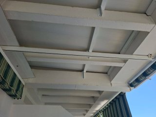 Toldo techo abatible verde y blanco