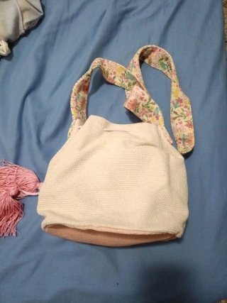 Bolso de tela con flecos y estampado floral