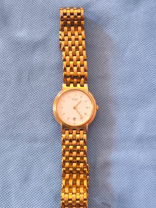 Reloj Seiko Quartz Dorado y Blanco