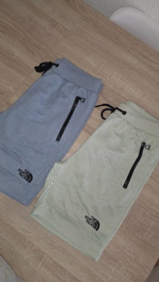 2 Pantalones The North Face azul grisaceo y crema