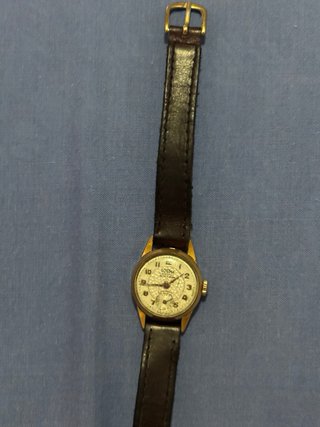 Reloj Dogma Prima Mecánico Dorado