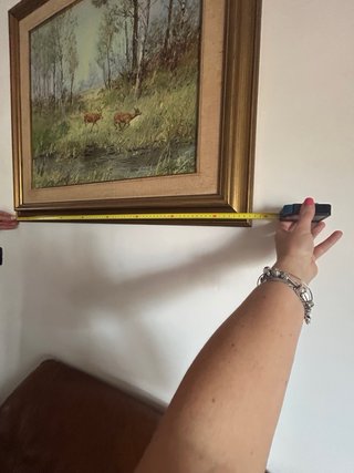 Dipinto con cervi in un bosco