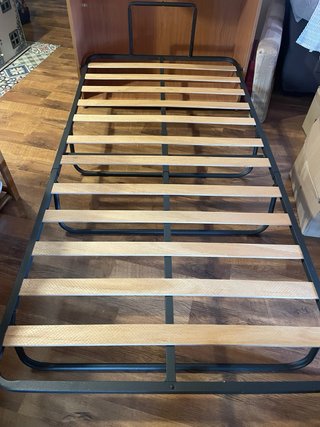 Cama plegable de madera nueva