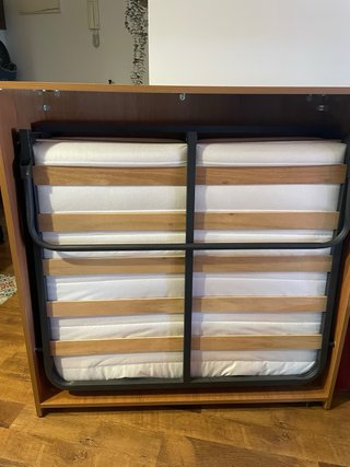 Cama plegable de madera nueva