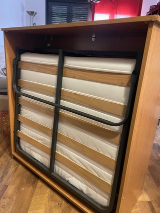 Cama plegable de madera nueva