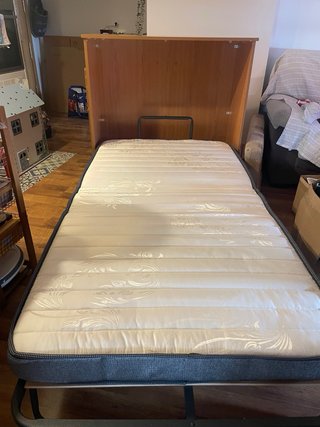 Cama plegable de madera nueva
