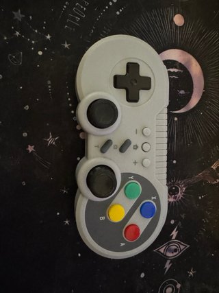Nintendo Switch Lite gris con funda